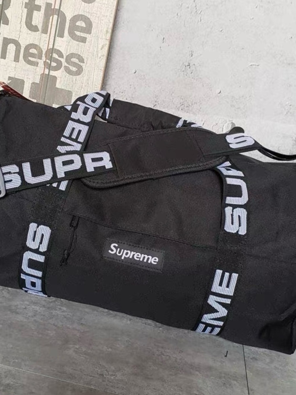 Supreme Black Duffle with White Logo Straps